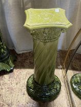 A large early 20th century ceramic column form planter stand, shipping unavailable