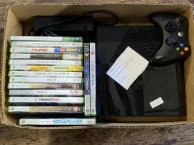 A Xbox 360E console with controls and fifteen games in working order