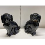 A pair of Staffordshire flatback spaniels