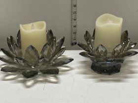 A pair of Julian McDonald table glass candle holders