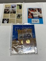 A selection of signed golfing ephemera including Fred Couples and others plus The Official 2004 US