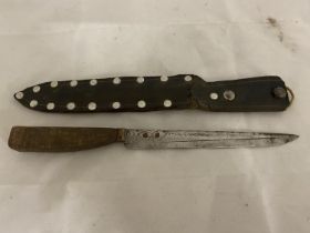 A vintage middle eastern handmade knife in sheath (over 18's only)