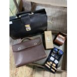 A selection of assorted vintage luggage, shipping unavailable