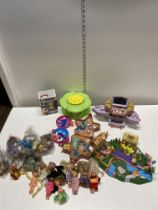 A box of Polly Pockets, and other toys