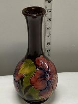 A William Moorcroft vase Hibiscus pattern