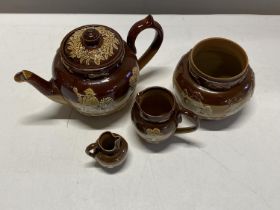 A selection of antique Royal Doulton pottery