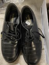 A pair of Dr Martens safety shoes size 6 slightly worn