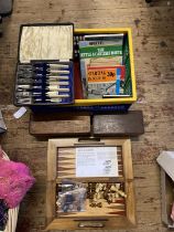 A box of assorted collectables and railway related books