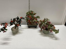 Three artificial Bonsai style tree's with glass leaves, flowers and fruit.