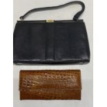 A Mappin & Webb lizard skin vintage handbag and a vintage crocodile skin purse.