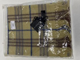 A new with tags Burberry 100% lambs wool yellow long scarf 120 x 23cm