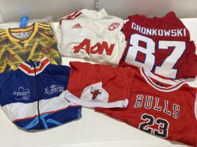A job lot of assorted sports clothes