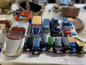 A selection of assorted playworn die-cast models