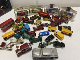 A box of assorted die-cast models