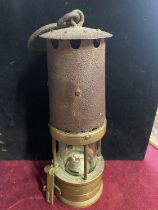 A vintage Ackroyd and Best early miners lamp