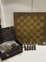 A large chess board with statue form pieces shipping unavailable