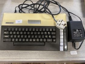 A Atari 800XL console with charger (powers up)