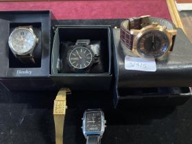 A job lot of assorted time pieces, the boxed including a working AVI-8 sport Automatic