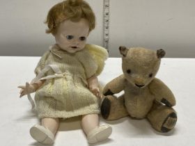 A vintage Pedigree doll and a Chad Valley teddy bear