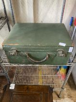 A vintage green leather vanity case