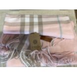 A new with tags U.RO ING pink shawl