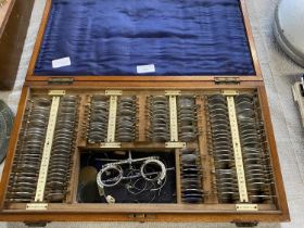 A antique cased optometrist's set