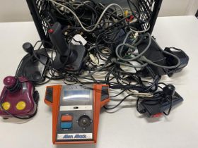 A job lot of vintage gaming accessories including Joy Sticks and assorted leads etc