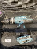 A Makita cordless drill (missing battery and charger)