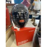 A new L 52 boxed crash helmet size L