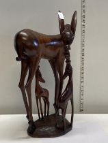 A heavy exotic wood African themed carving (carved from one piece of wood) h56cm shipping