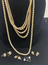 A selection of simulated pearl necklaces and earrings with silver clasps etc