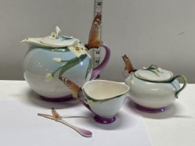 A Franz Porcelain tea set decorated with butterflies (No damage)