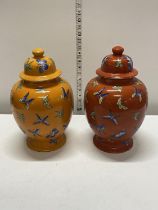 A pair of ceramic ginger jars decorated with butterflies h34cm shipping unavailable