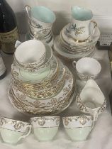 Two part tea services Queen Anne Louise pattern and Royal Vale