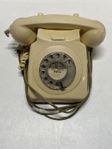 A vintage cream telephone