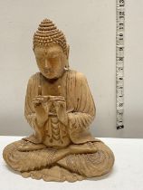 A hand carved Chinese hardwood Budda