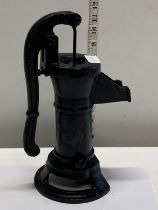 A cast iron miniature water pump