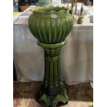 A early 20th century green glazed planter stand and planter, shipping unavailable