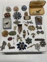 A large selection of good quality costume brooches