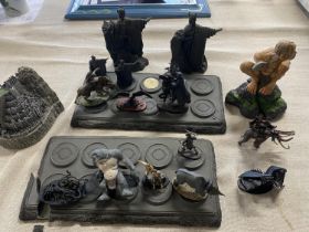 A selection of assorted makers Lord of the Rings figures and stands (damage to one stand)