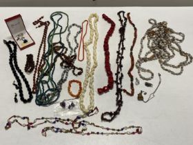 A selection of assorted vintage costume jewellery necklaces
