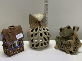 Three assorted ceramic candle holders