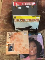 A job lot of mixed genre LP's in carry case shipping unavailable