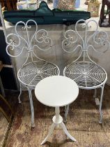 A pair of grey metal garden chairs with a wooden wine table, shipping unavailable