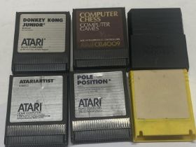 Six assorted vintage Atari gaming cassettes