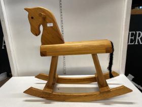 A child's wooden rocking horse, shipping unavailable