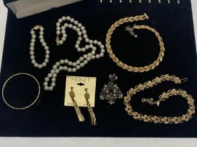 A selection of quality costume jewellery including Napier, Trifari and Monet etc