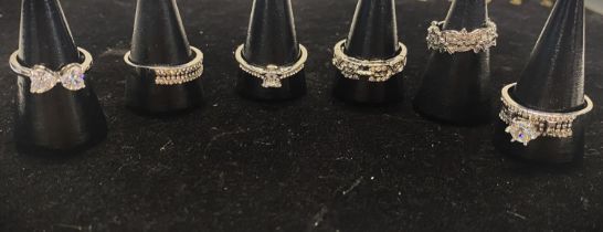 Six stamped 925 silver rings