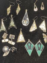 A selection of assorted Mexican silver pendants and earrings