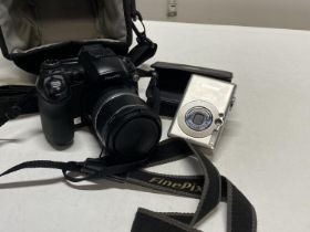 A Finepix digital camera and a Canon digital camera (untested)